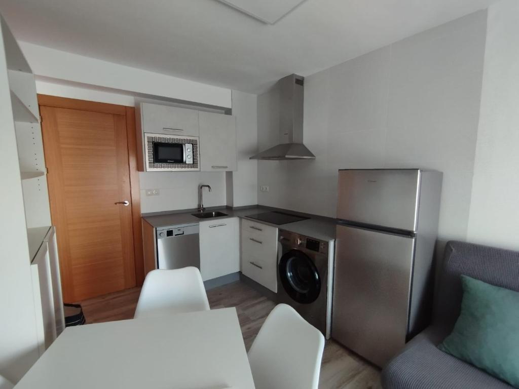 Kuchyňa alebo kuchynka v ubytovaní Apartamento Victoria Plaza