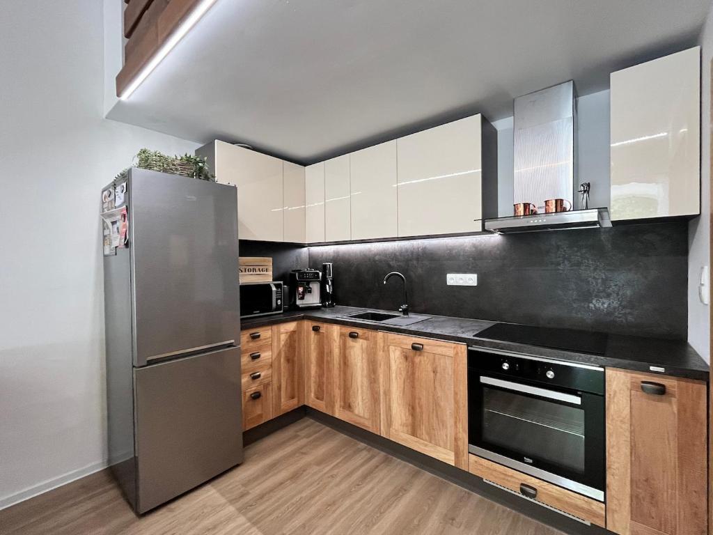 Kuchyň nebo kuchyňský kout v ubytování Apartmán Potůček