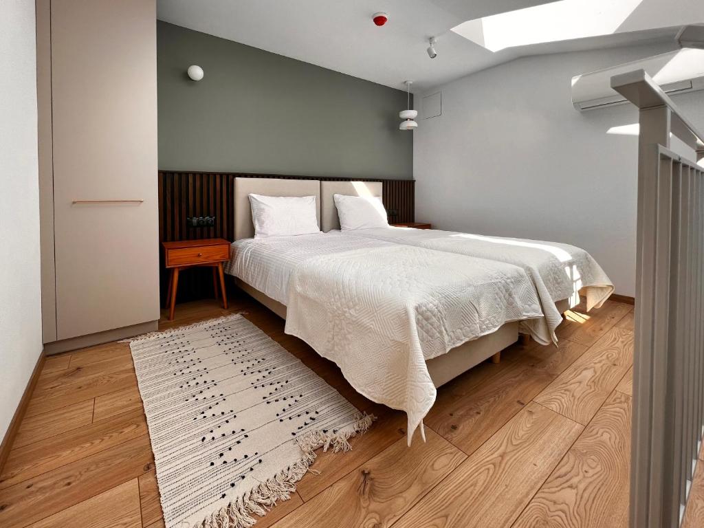 Posteľ alebo postele v izbe v ubytovaní Monciak55 Sopot Apartments