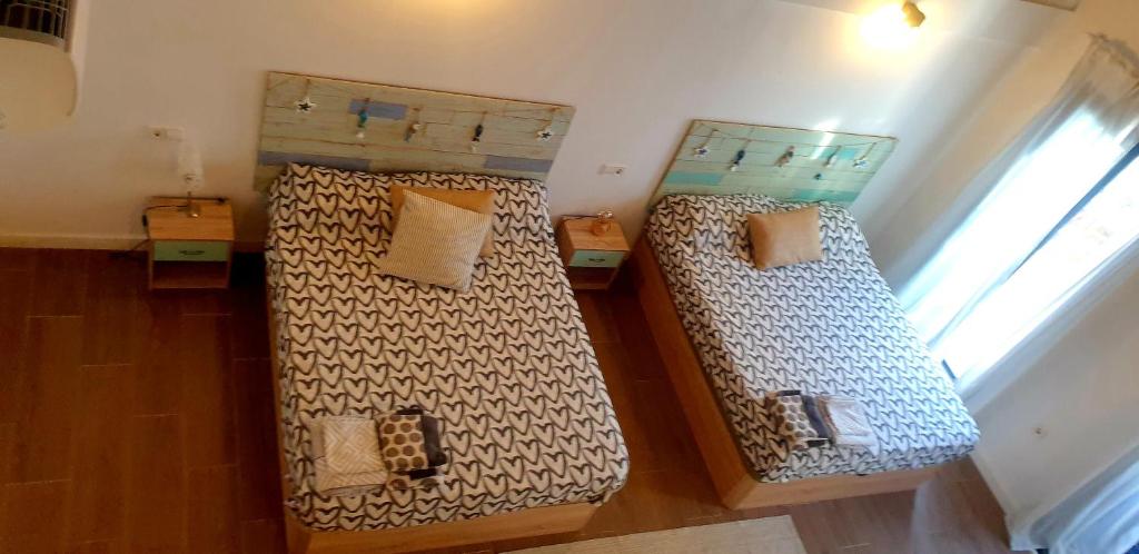 Postel nebo postele na pokoji v ubytování Espectacular apartamento en la Isla de Tabarca