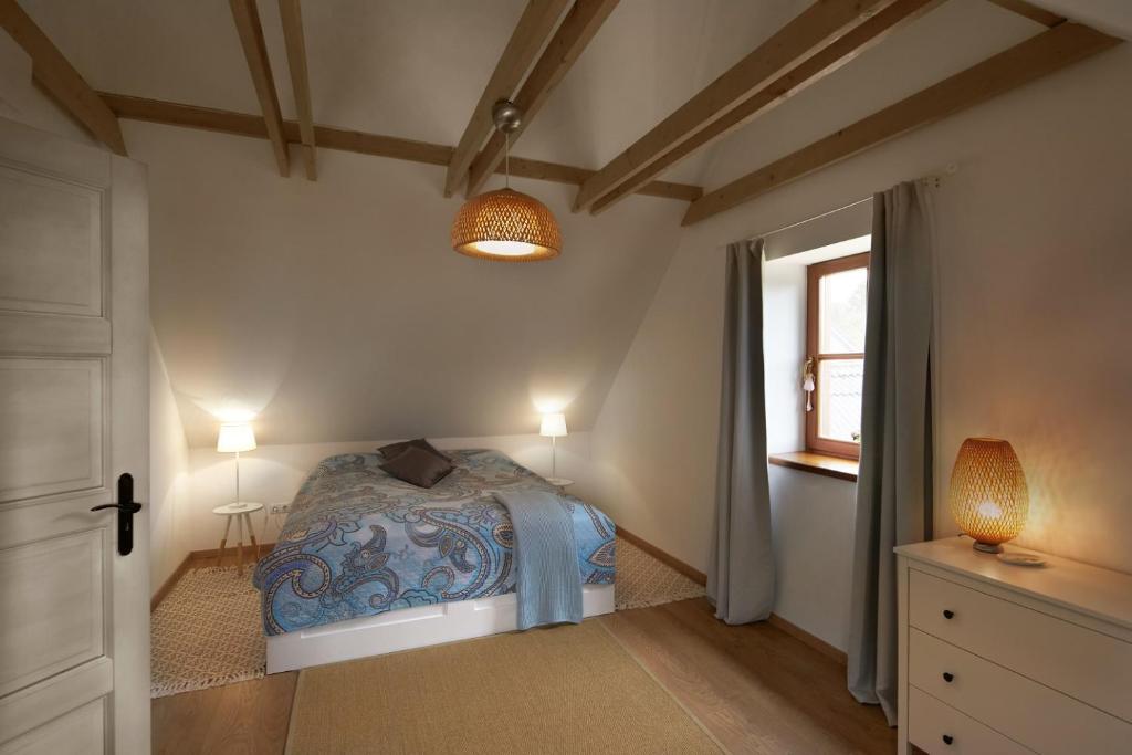Postel nebo postele na pokoji v ubytování D4 Apartments Dörgicse