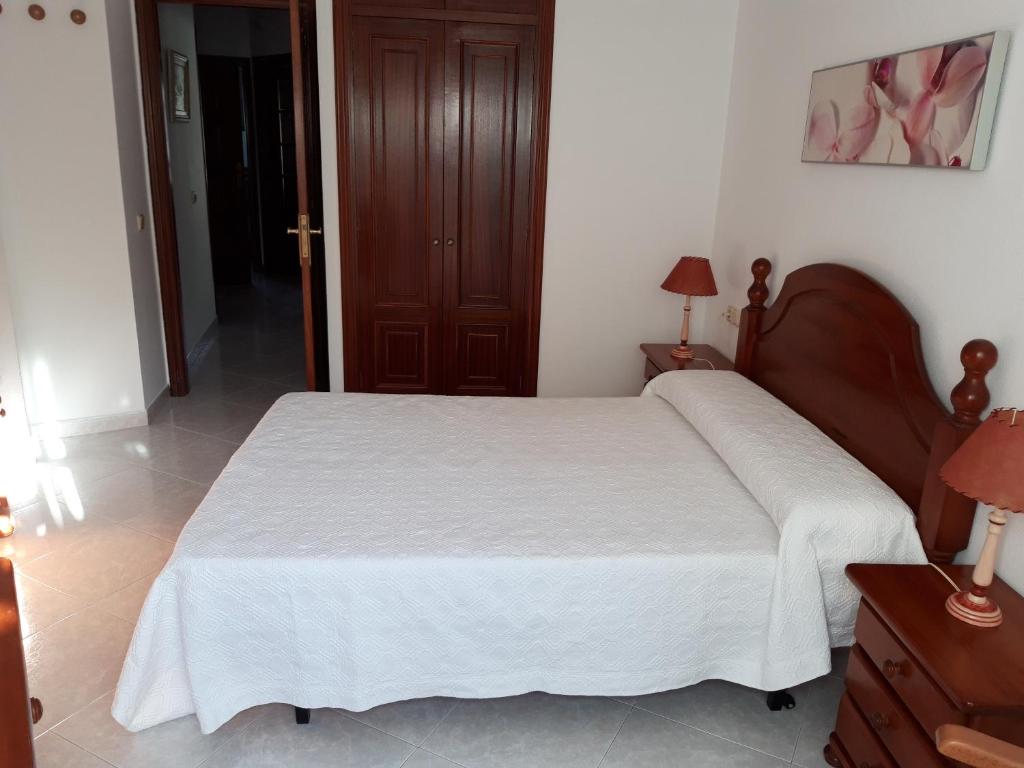 Posteľ alebo postele v izbe v ubytovaní ChavesB Apartamento en Vilaxoan de Arousa