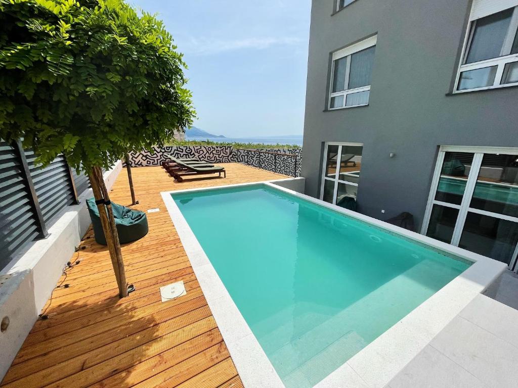Cozy seaside apartment with private pool & terrace