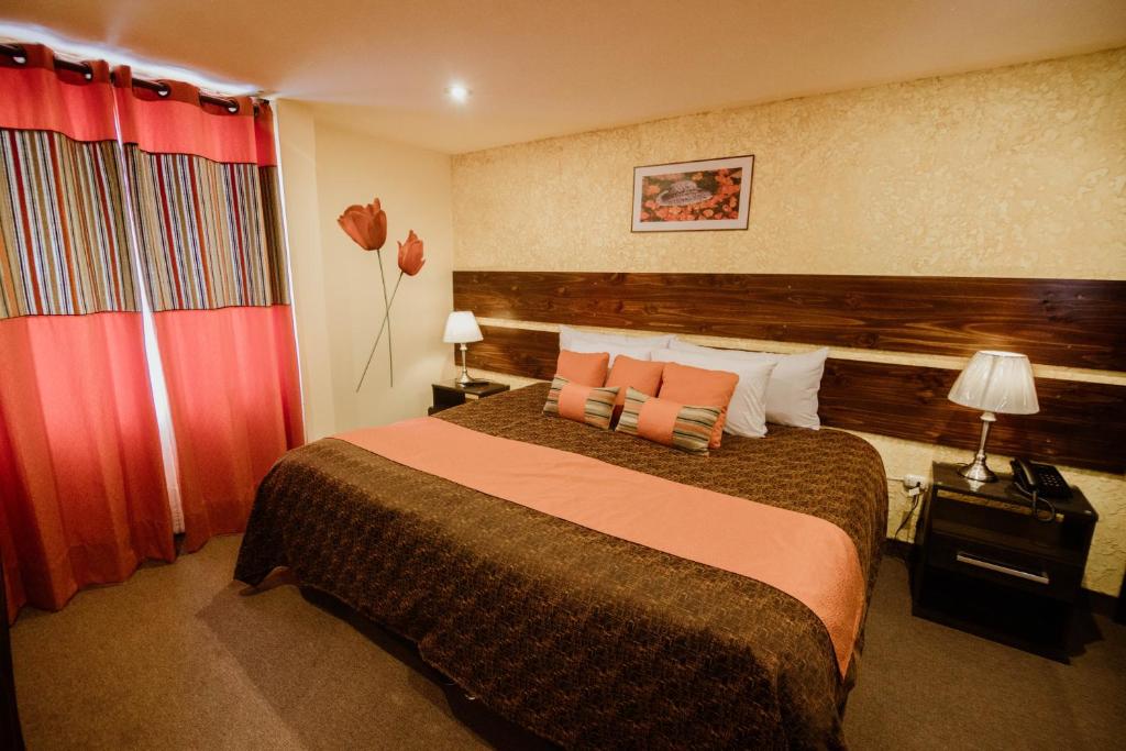 Postel nebo postele na pokoji v ubytování Vita Hoteles Colca