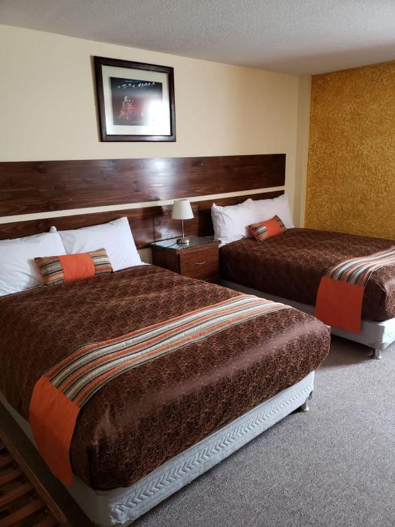 Postel nebo postele na pokoji v ubytování Vita Hoteles Colca