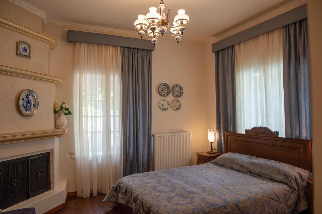 Posteľ alebo postele v izbe v ubytovaní Archontiko Stamou