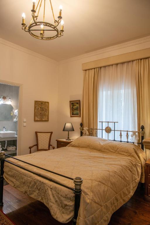 Posteľ alebo postele v izbe v ubytovaní Archontiko Stamou