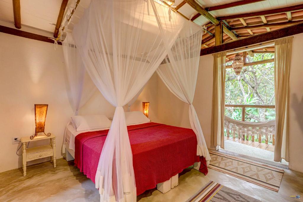 Cama ou camas em um quarto em Pousada Ilha Verde