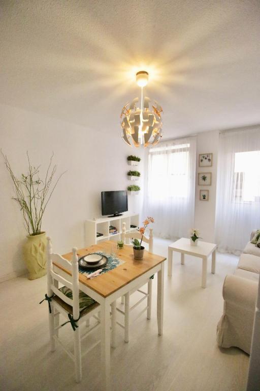 Uma TV ou centro de entretenimento em Sweet Home Apartaments