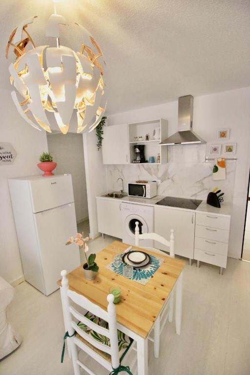 A cozinha ou cozinha compacta de Sweet Home Apartaments