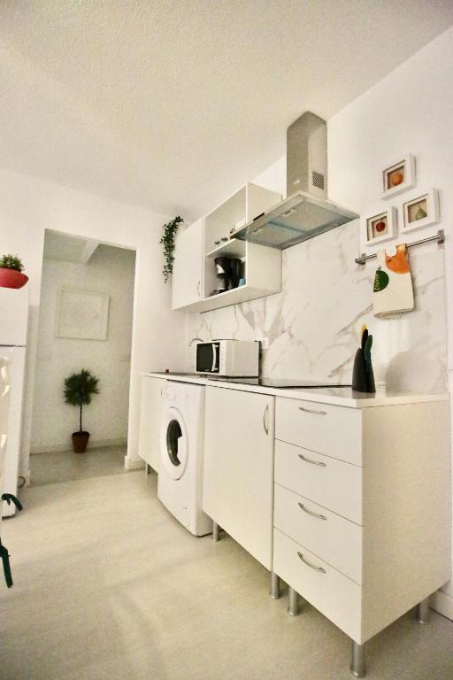 A cozinha ou cozinha compacta de Sweet Home Apartaments