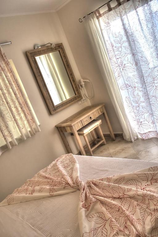 Ένα ή περισσότερα κρεβάτια σε δωμάτιο στο Modi Resort
