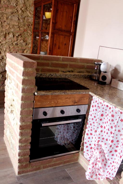 Kuchyňa alebo kuchynka v ubytovaní Agriturismo Fonte Belvedere