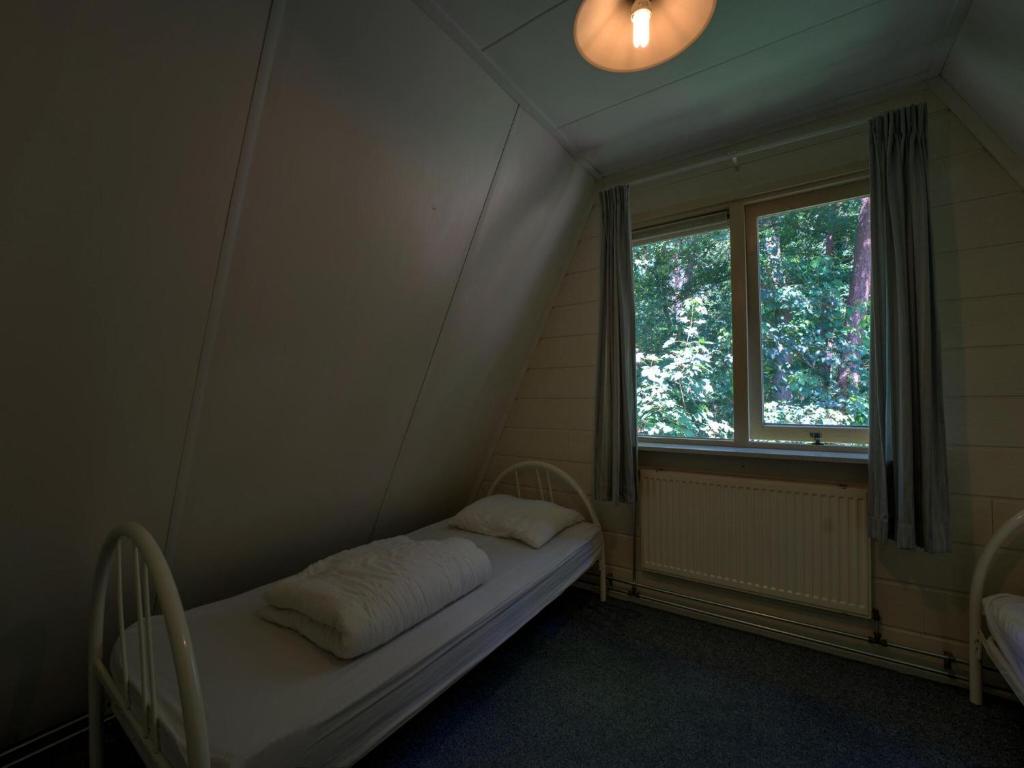 Fotografie z fotogalerie ubytování Cosy holiday home in Eerbeek with balcony terrace v destinaci Eerbeek