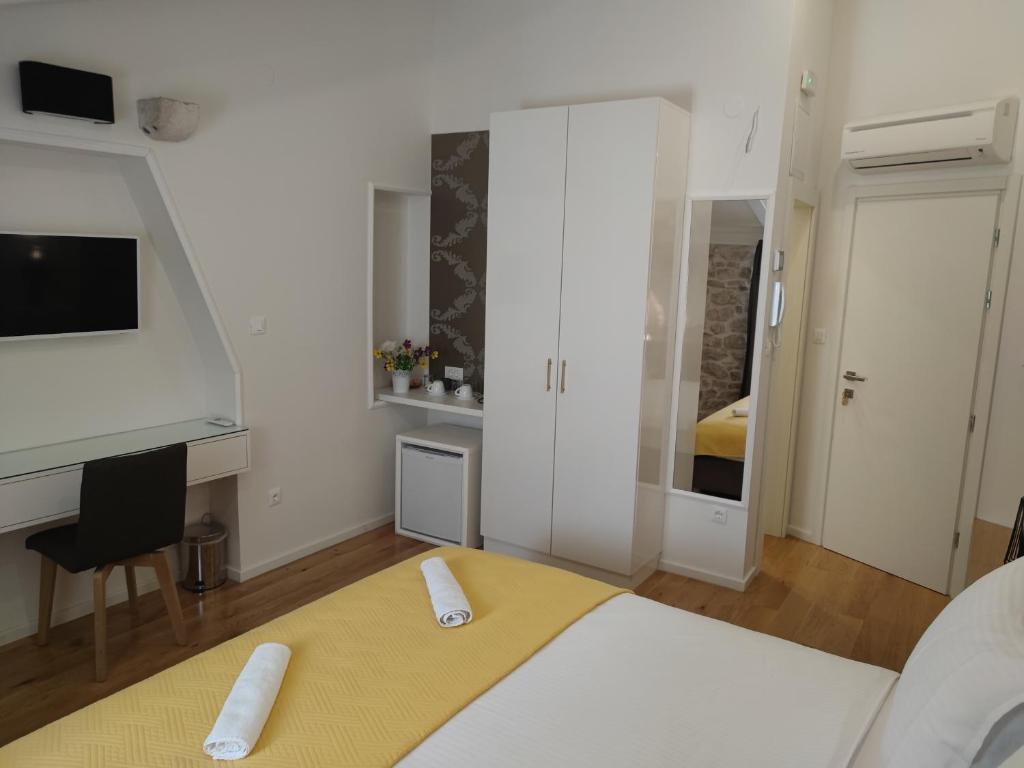 Posteľ alebo postele v izbe v ubytovaní S-Rooms