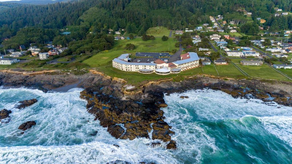 an aerial view of a resort on the edge of the ocean at Adobe Resort in Yachats