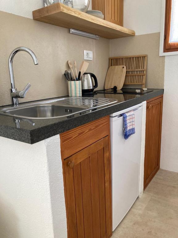 Kuchyň nebo kuchyňský kout v ubytování Apartments Mimoza Komiza