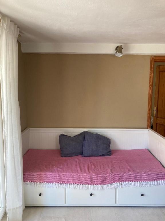 Postel nebo postele na pokoji v ubytování Apartments Mimoza Komiza