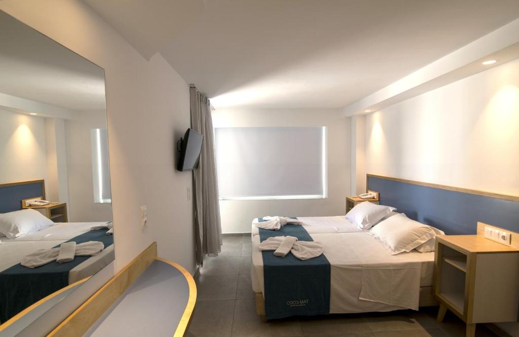 Posteľ alebo postele v izbe v ubytovaní Alia Beach Hotel by Estia