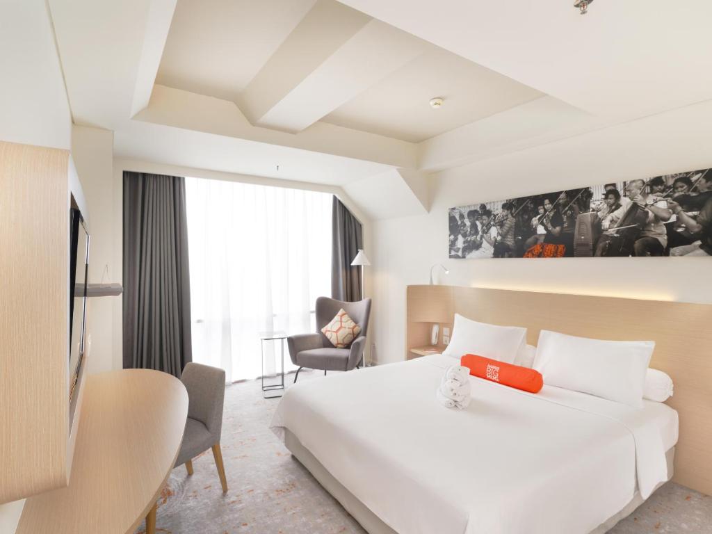 Letto o letti in una camera di HARRIS Suites fx Sudirman