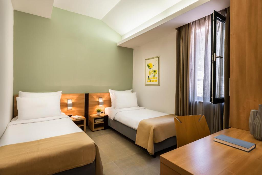 Ein Bett oder Betten in einem Zimmer der Unterkunft Maistra Select Petalon Resort