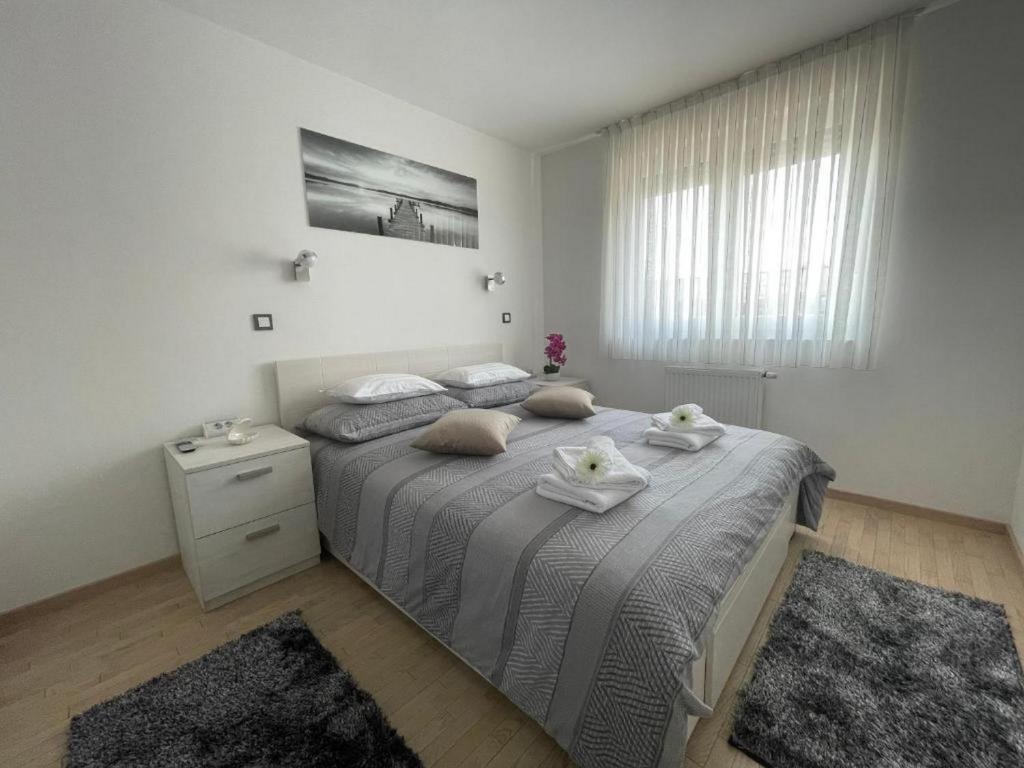 Posteľ alebo postele v izbe v ubytovaní Apartment Vuky