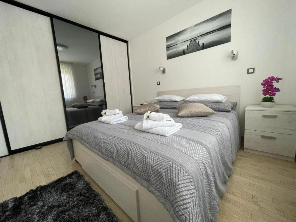 Posteľ alebo postele v izbe v ubytovaní Apartment Vuky