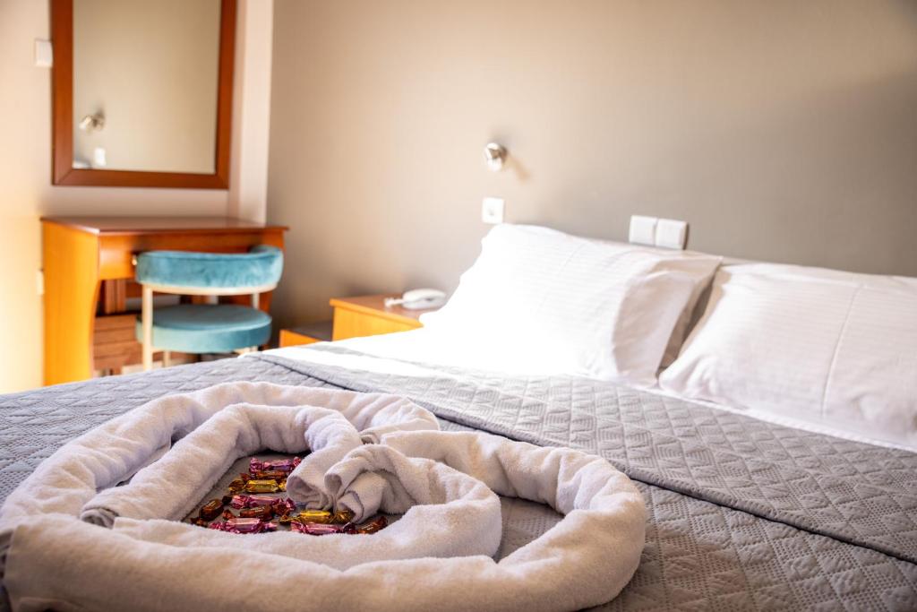 Postel nebo postele na pokoji v ubytování Hotel Galaxy