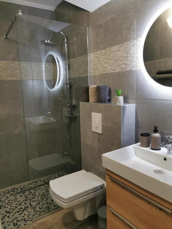 Kúpeľňa v ubytovaní Apartmani Tripalo