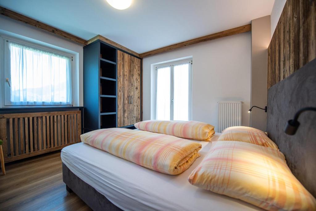 Łóżko lub łóżka w pokoju w obiekcie Apartments Seida