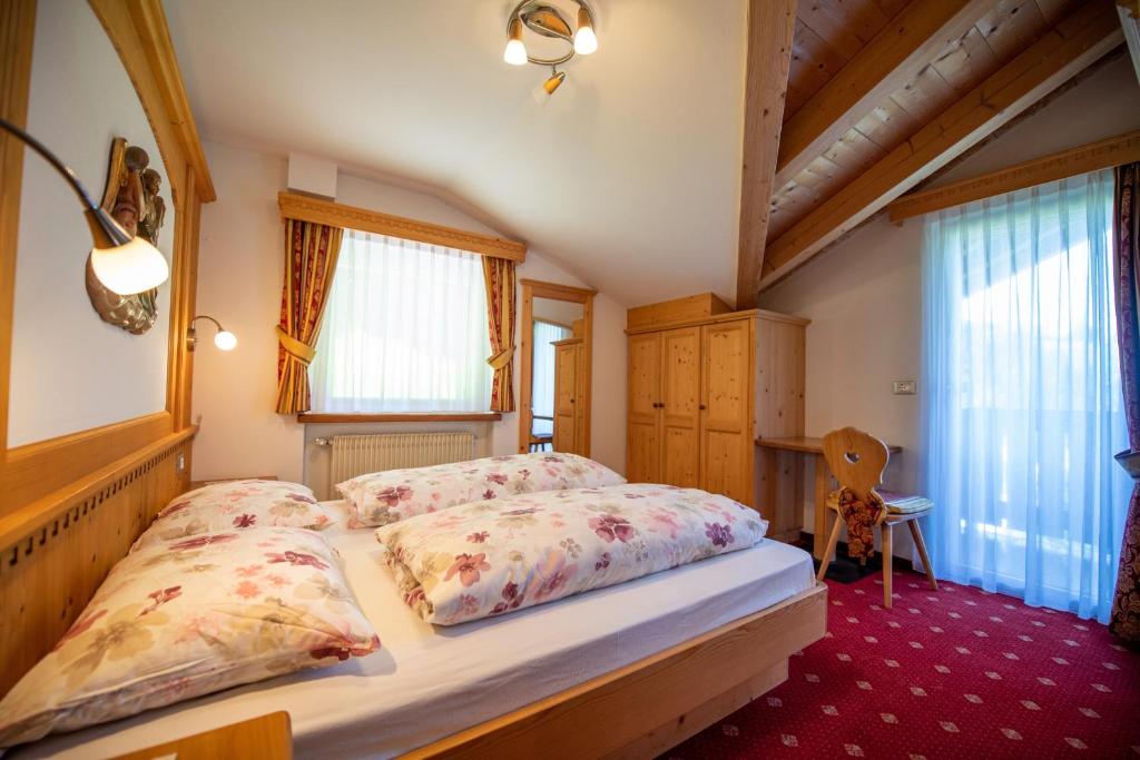 Łóżko lub łóżka w pokoju w obiekcie Apartments Seida