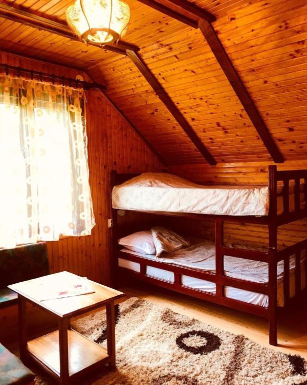 Postel nebo postele na pokoji v ubytování Seoska kuća Jela