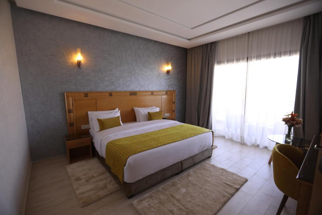 Postel nebo postele na pokoji v ubytování Z Hotel Meknes