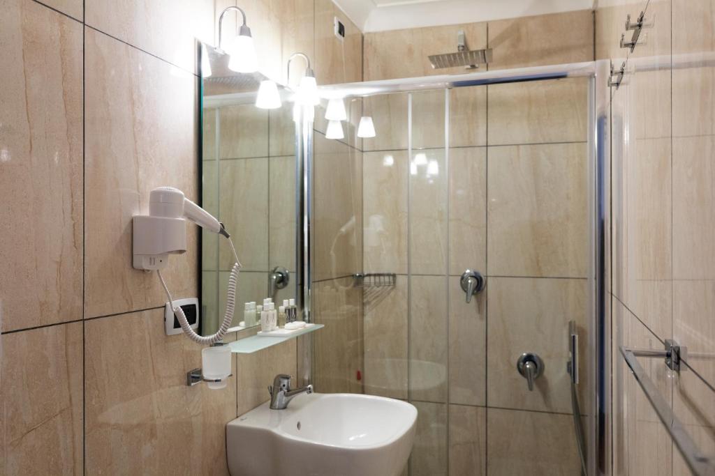 Koupelna v ubytování Rex Lifestyle Hotel