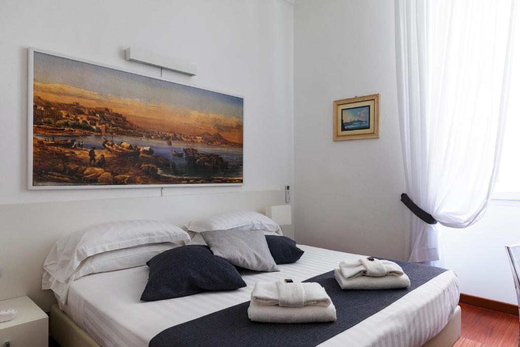 Postel nebo postele na pokoji v ubytování Rex Lifestyle Hotel