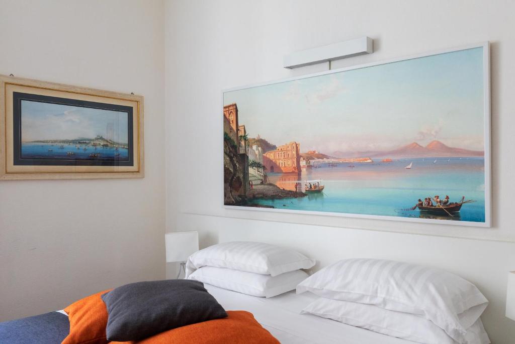 Postel nebo postele na pokoji v ubytování Rex Lifestyle Hotel