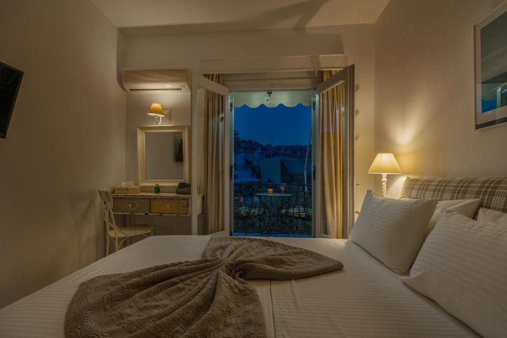 Letto o letti in una camera di Arolithos