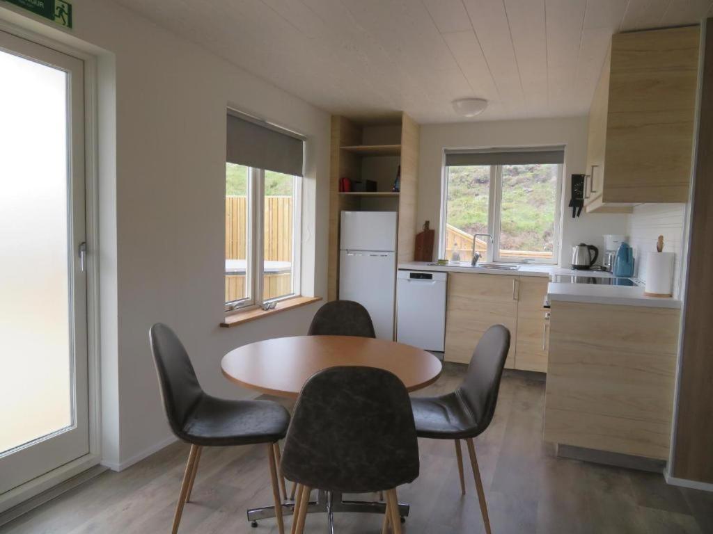 Kuchyň nebo kuchyňský kout v ubytování Mosas cottages