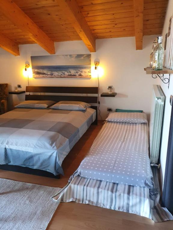 Postel nebo postele na pokoji v ubytování Casa Ori