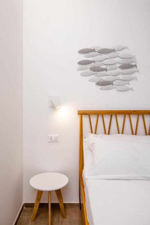 Łóżko lub łóżka w pokoju w obiekcie Kaary BellaVita Superior Room