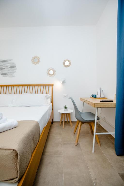 Łóżko lub łóżka w pokoju w obiekcie Kaary BellaVita Superior Room