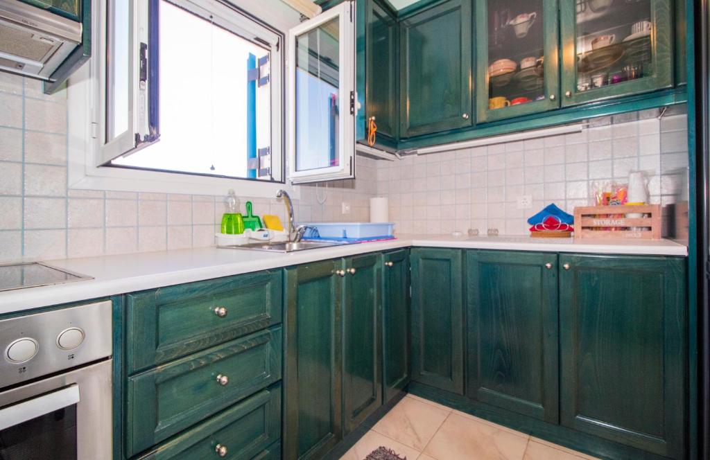 A kitchen or kitchenette at Laconian Collection ''Le Bleu Infini''