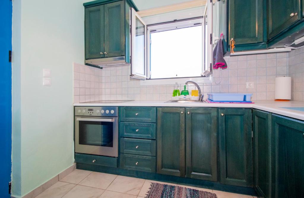 A kitchen or kitchenette at Laconian Collection ''Le Bleu Infini''