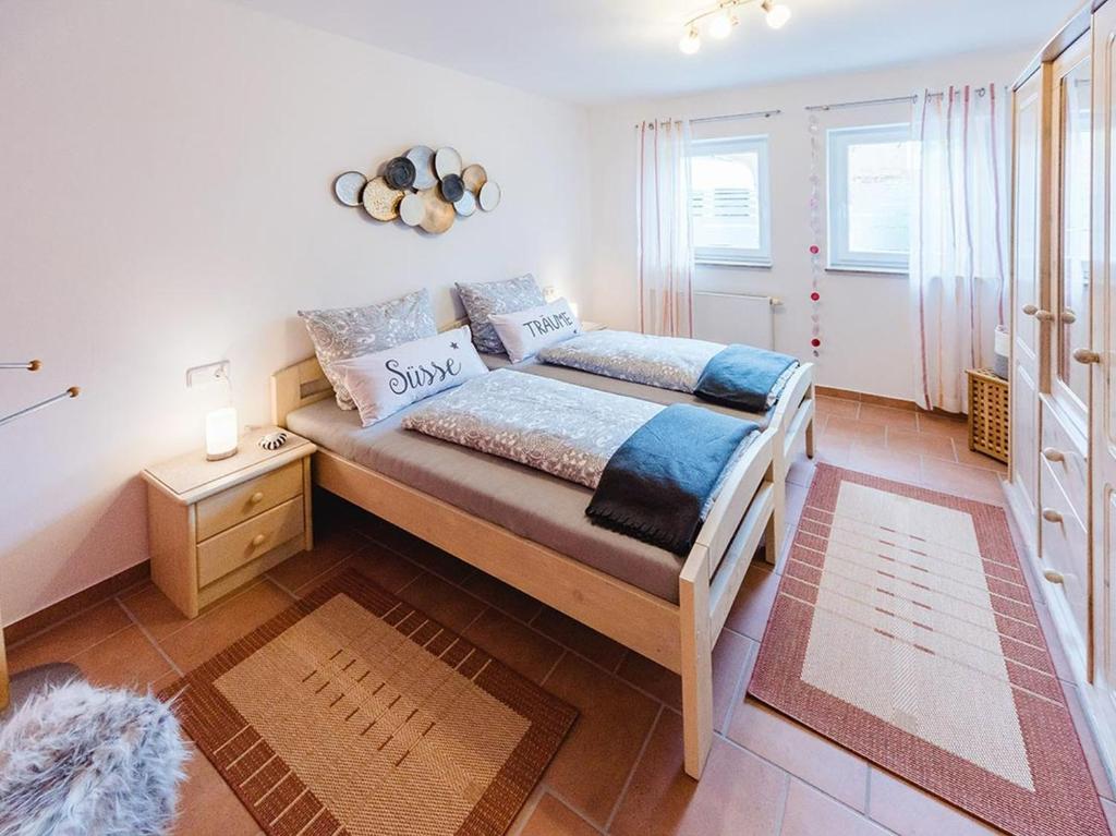 Postel nebo postele na pokoji v ubytování Ferienwohnung Storchenaue