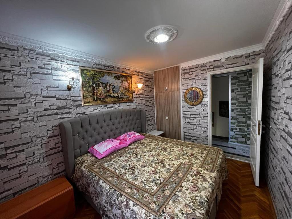 Postel nebo postele na pokoji v ubytování Дом в курортном городе Эгейского побережья.