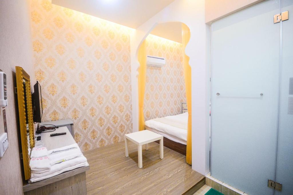 Postel nebo postele na pokoji v ubytování 綠蠵龜潛水住宿