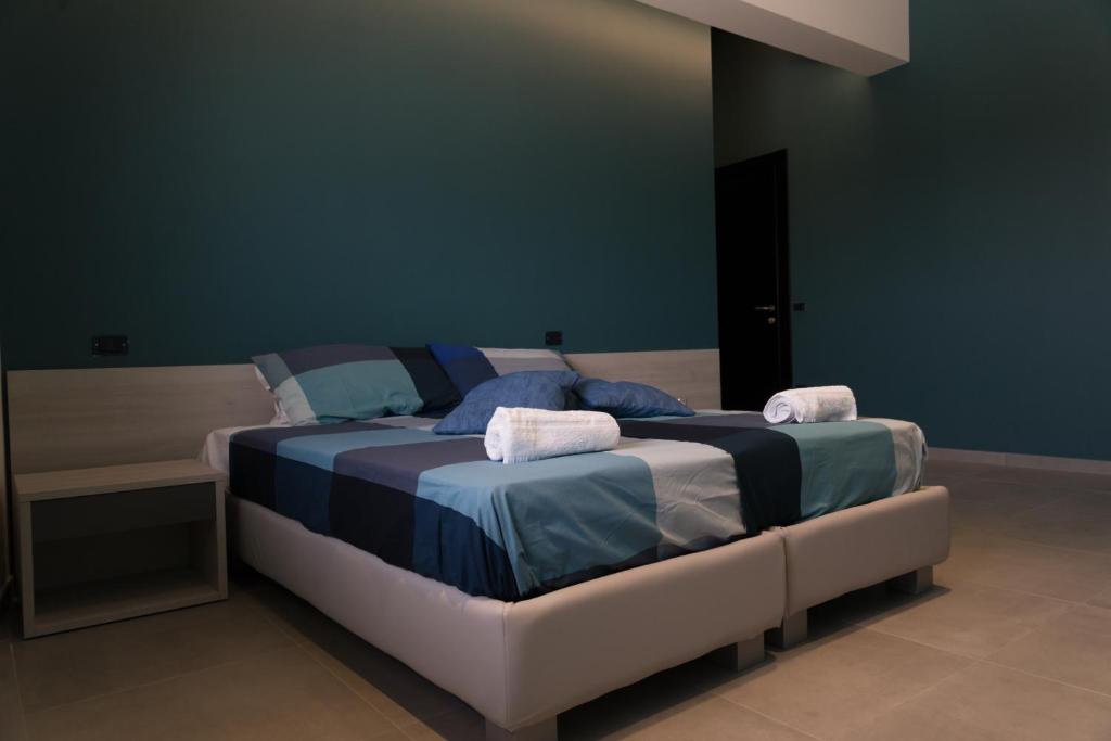 Posteľ alebo postele v izbe v ubytovaní Luna Nova Rooms