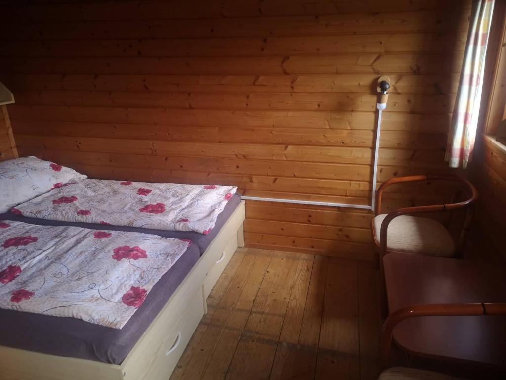 Postel nebo postele na pokoji v ubytování Chata Orlice