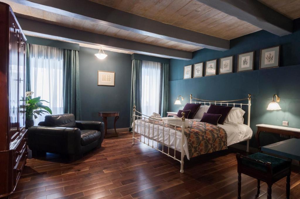 Postel nebo postele na pokoji v ubytování The Coleridge Boutique Hotel In Valletta