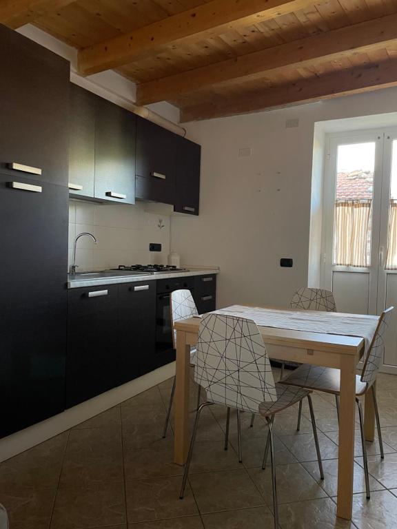 A kitchen or kitchenette at Archi di sole - Appartamenti